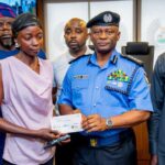IGP Olutunji Disu presents cheques to victims family